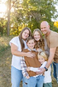 This is a photo of owner, Steve Macke, and his wife and three kids.